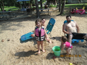 Children playing in sand.