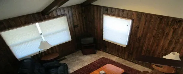 Cabin 10 upstairs landing with pecan stained walls