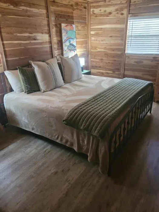Cabin 3 master bedroom with a king bed