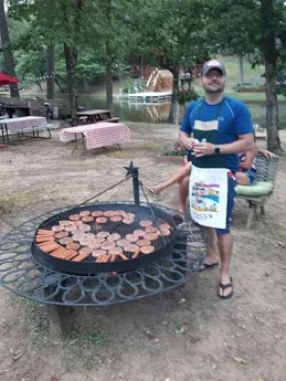 Grilling over the outdoor fire pit