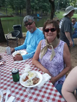 Guests at a picnic table on the property