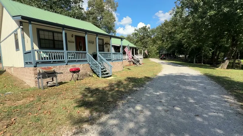 Cabin porches along the lane