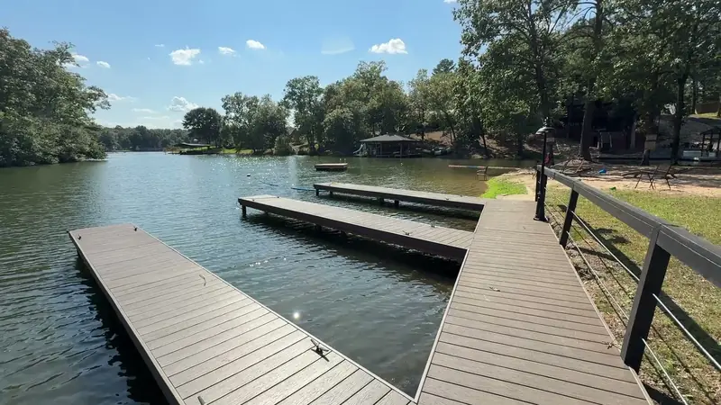 The boat dock reaching out into the cove